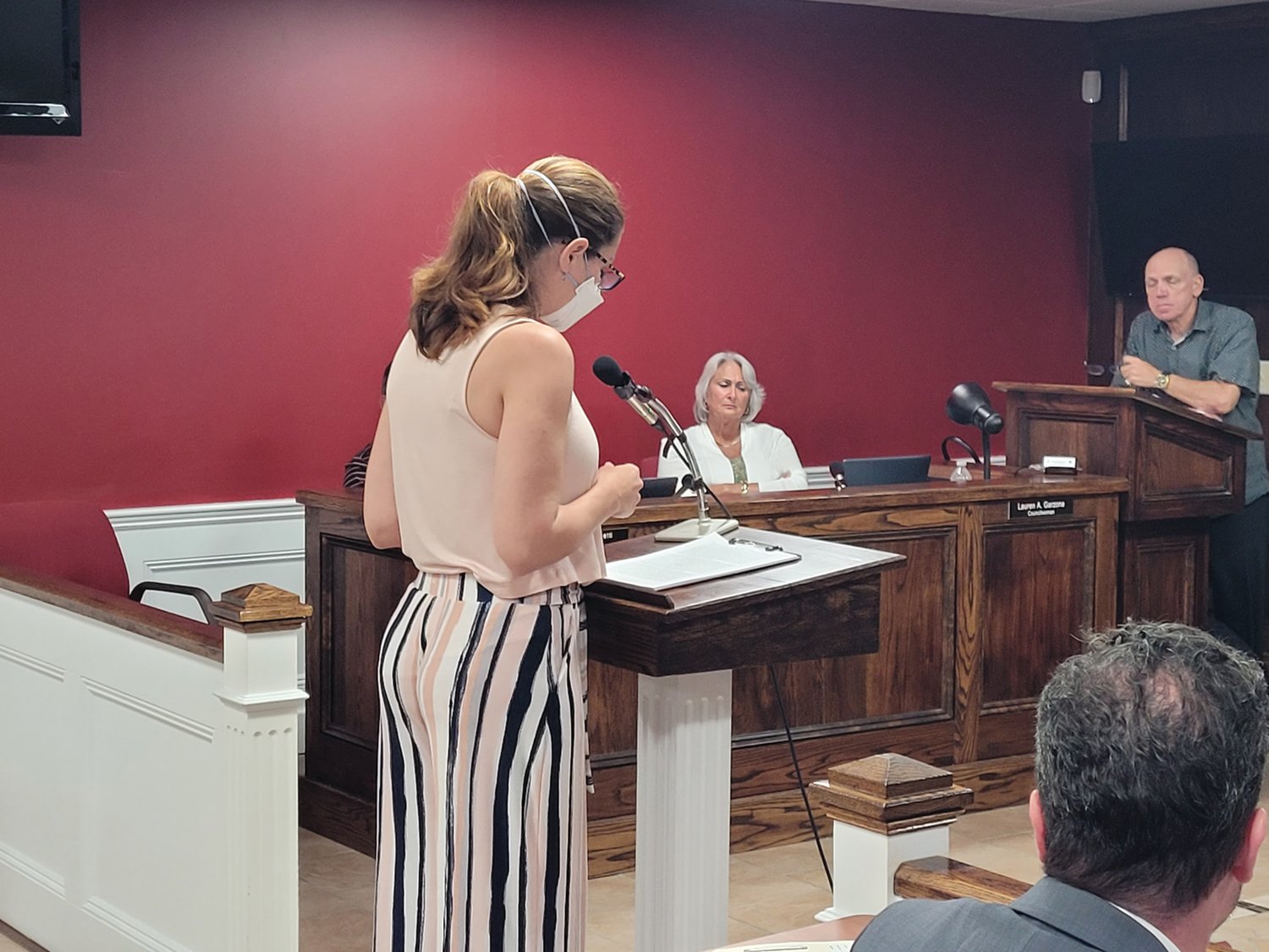 QUESTIONS POSED: Johnston resident Amy Dixon addressed the Town Council Tuesday night, asking questions about ‘Project Schooner,’ the new Amazon distribution facility proposed for a wooded location near the intersection of routes 6 and 295.